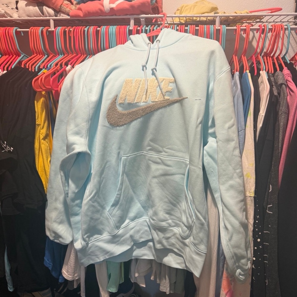 Nike Light Blue Hoodie with Silver Logo